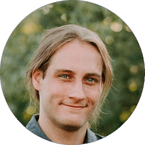 Brett Evans smiling during a family photo op